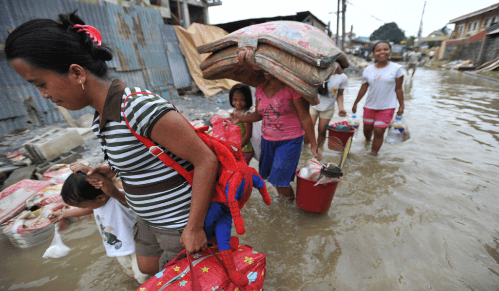 Community Adaptation to Displacement from Natural Disasters